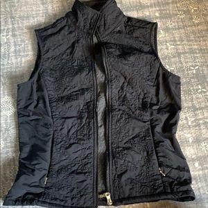 Lucy fitted black vest. NWOT